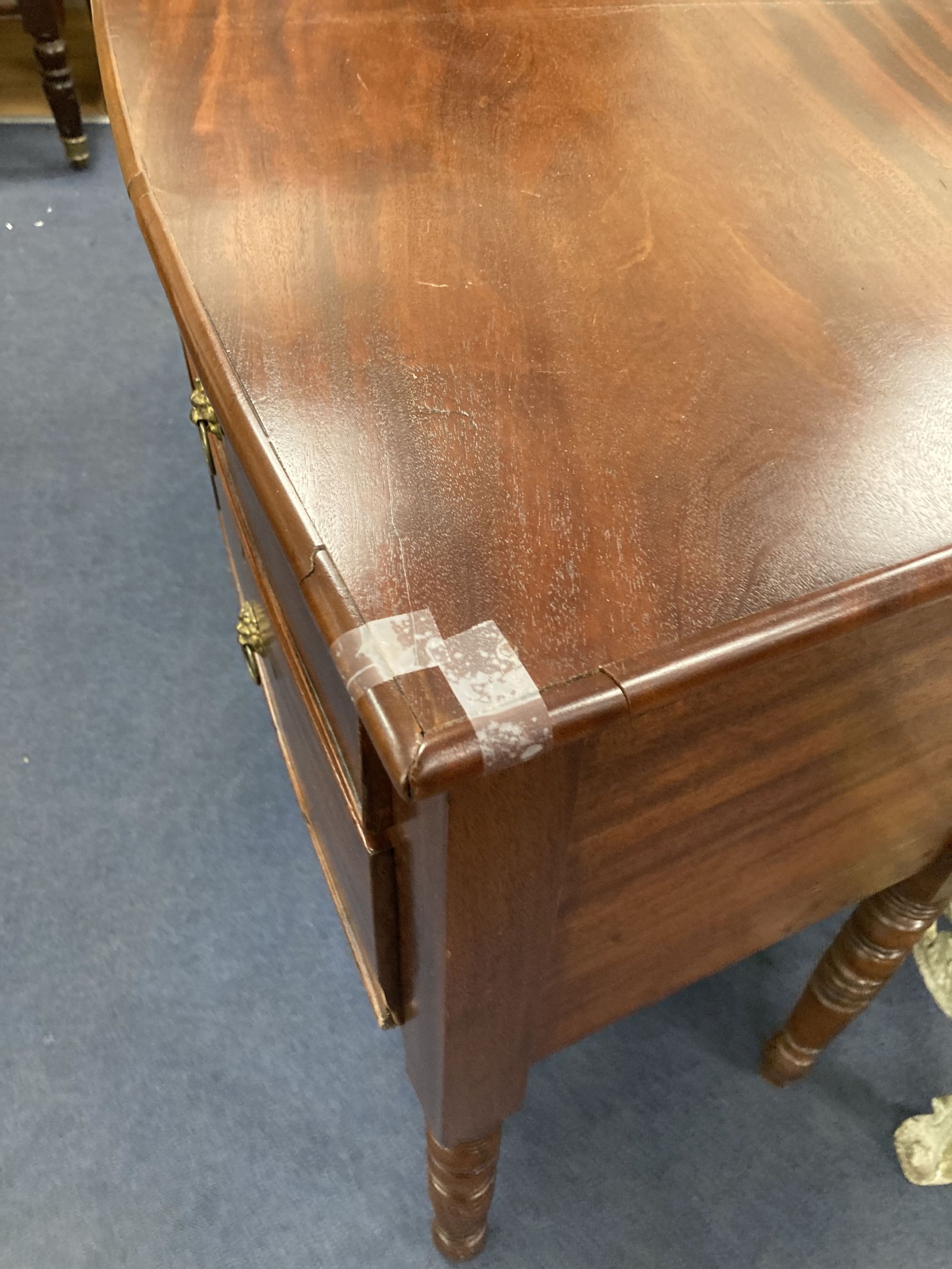 A Regency mahogany bowfront sideboard, width 145cm depth 51cm height 82cm